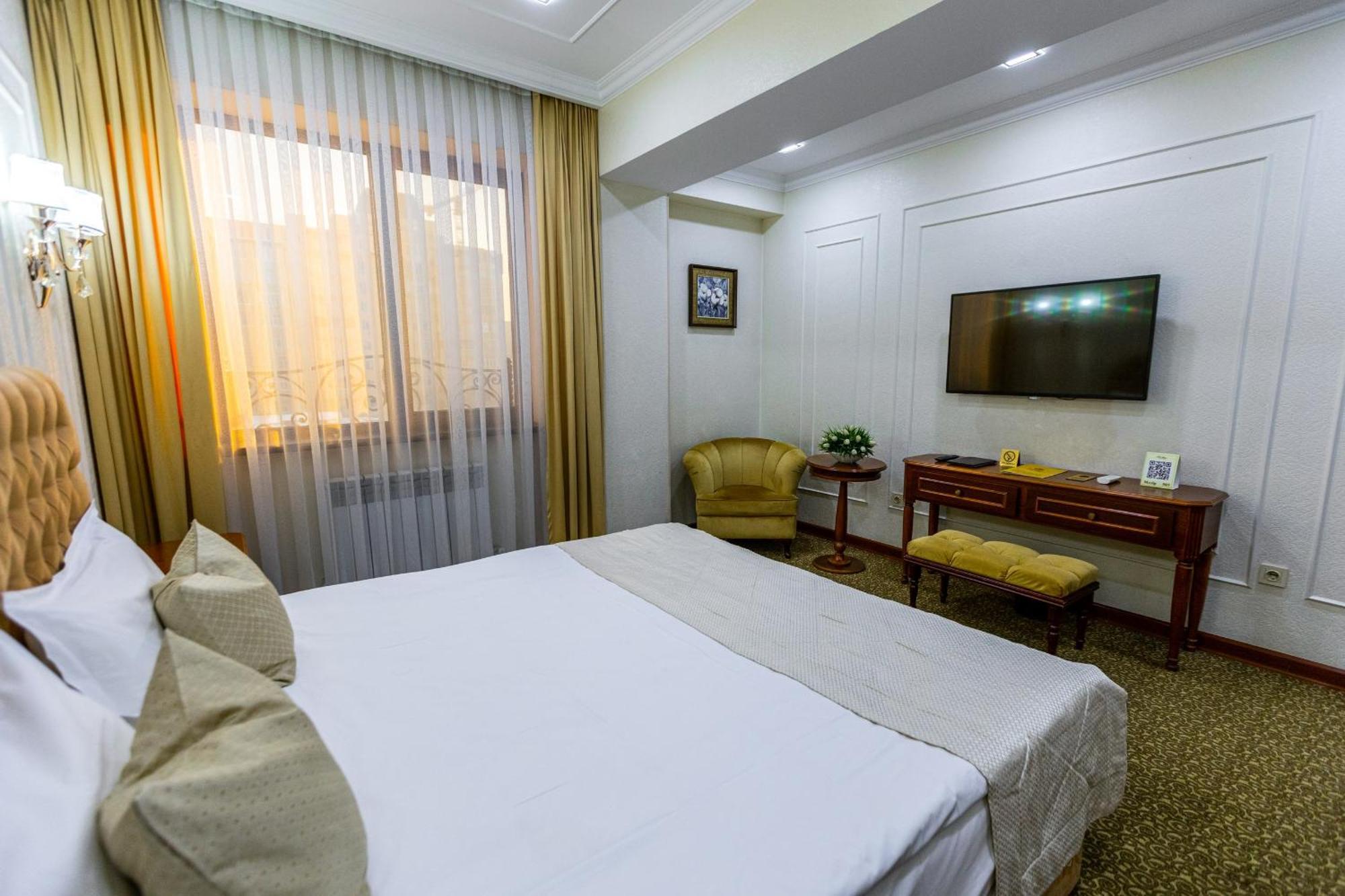 Plaza Hotel Almaty Chambre photo